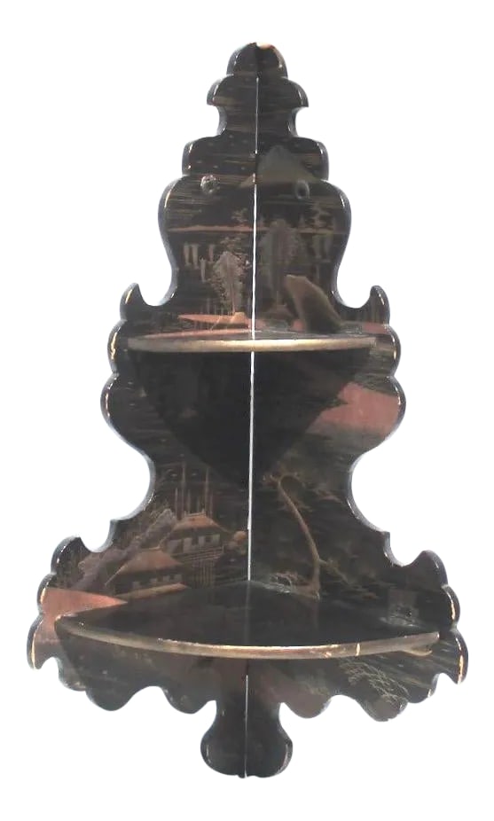 Japanese Lacquered Corner Two Tier Shelf: Folding corner shelf made mid 19th-century Japan. Two quarter-round small shelves that attach to one side by hinges and fold up to transport and drop down to set pins on the opposing side to lock the