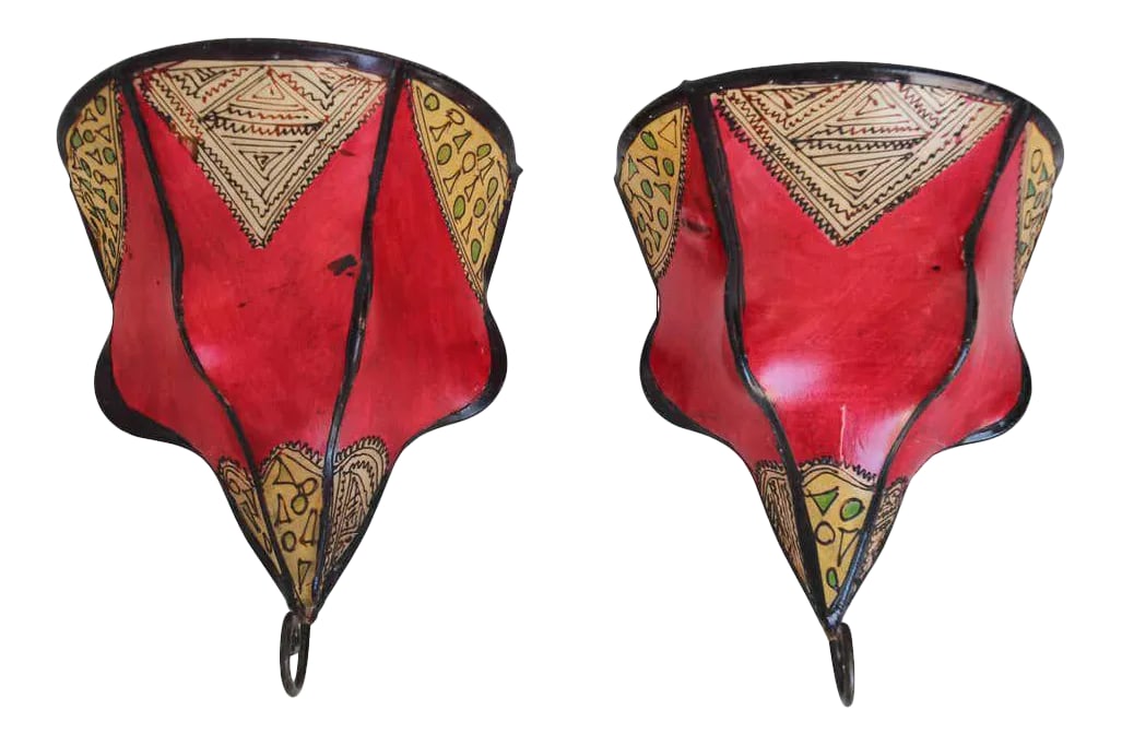 Pair of Parchment Moroccan African Art Wall Curved Sconce: African Tribal Art parchment wall shade sconce featuring a large curved hide form stitched on iron and hand painted surface. These Moroccan Art pieces could be used as wall lamp shade. Iron frame
