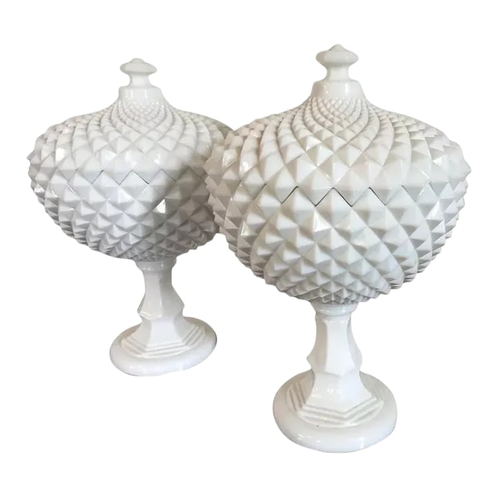 Vintage Milk Glass Covered Centerpiece Bowl with Saw Tooth Design - a Pair: Vintage pair of large milk glass covered fruit bowls with an overall sawtooth design. Each bowl raised on a tall stem. Nice shape and design. Each measures 14" tall x 9 1/4" diameter. Good condition -