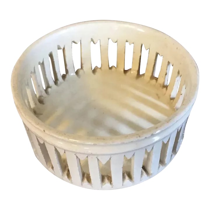 Antique 18th Century Creamware Reticulated Wine Decanter Bottle Coaster Trivet: Antique 18th century creamware wine bottle coaster. Hand cut reticulated grill to the sides. Measures 3 3/8" diameter x 1 1/2" tall. Good condition. Condition: Alterations: Original Condition Unaltere