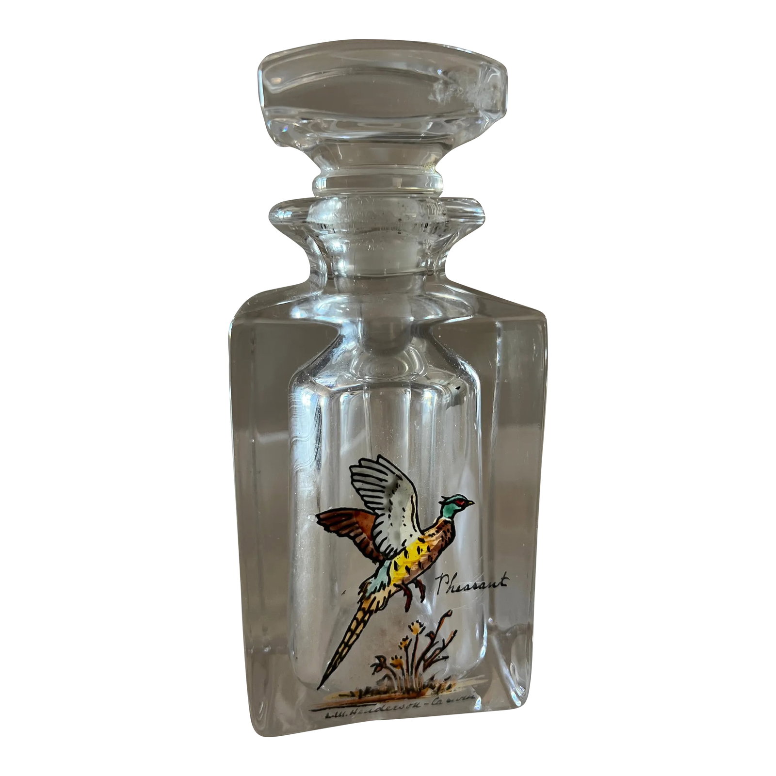 Mid Century Carwin Crystal Cologne or Perfume Bottle: Mid Century cologne or perfume bottle by Carwin makers of quality crystal glassware. This bottle has a hand painted pheasant signed by the artist - Henderson. The dauber or stopper is etched at the