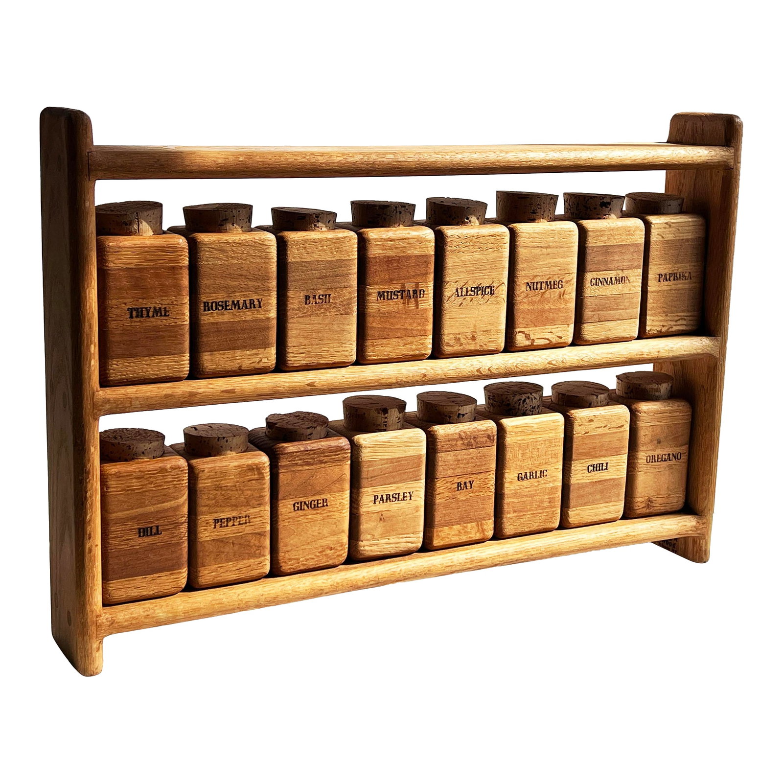 Vintage Mid Century Modern Solid Wood Spice Rack With 16 Solid Oak Jars and Cork Lids: This beautifully crafted spice rack by Knock on Wood of Ithaca NY in the 1960's, features 16 hand-labeled solid oak spice jars with natural cork lids. A beautiful example of American craftsmanship in 