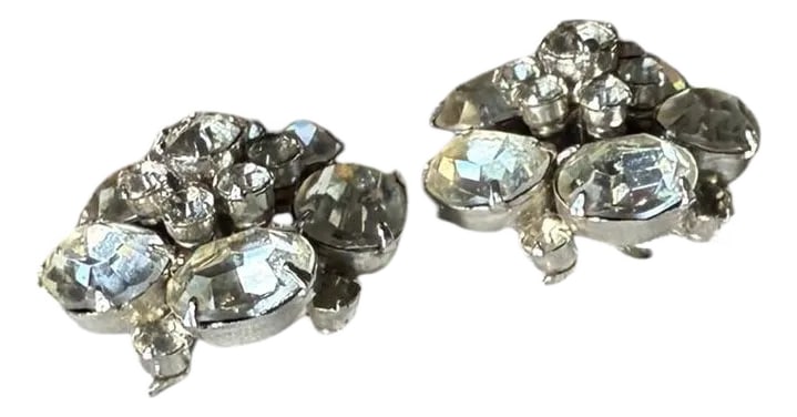1950s Vintage Coro Faux Diamond Cluster Clip on Earrings, A Pair: Vintage Coro Costume clip on Earrings Tiered cluster faux diamonds. Mid-20th century Marked Coro on Levered Back 1" round x .5" deep Condition: Alterations: Original Condition Unaltered