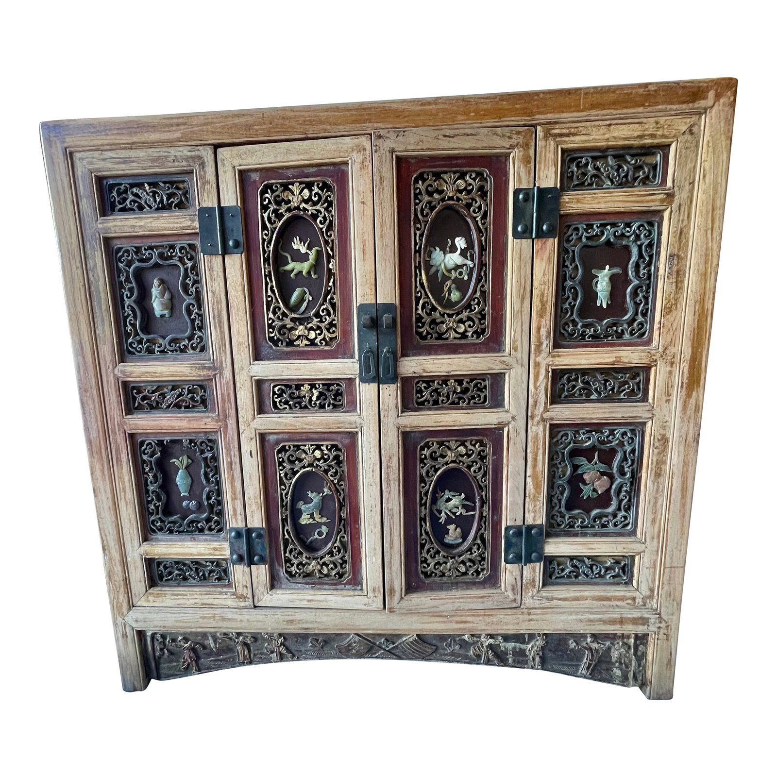 Mid 20th Century Asian Red Brown Sideboard/Cabinet Carved Wood Applied Hardstone Figural: This is a great looking Asian design two door cabinet that would work wonderfully as a sideboard. The front is divided into sections that have beautiful carved wood panels some of which surround