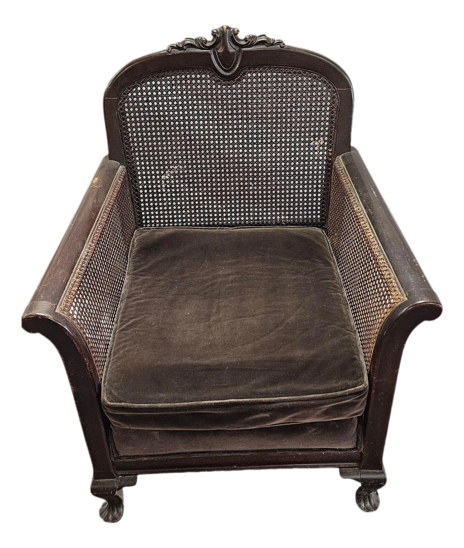 Antique French Louis XV-Style Double-Caned Bergere Wingback Armchair: Antique French Louis XV-Style Double-Caned Bergere Wingback Armchair This exquisite antique French Louis XV-style bergere armchair is a masterclass in eighteenth-century revival craftsmanship, offerin
