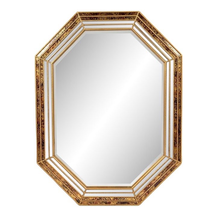 1970s Octagonal Eglomise Mirror in Faux Tortoise - Hollywood Regency Style - Styled After Maison Jan: Found in its original vintage condition, this octagonal mirror is a quintessential example of 1970s Hollywood Regency design. The frame is crafted with Eglomise (reverse-painted glass), creating a