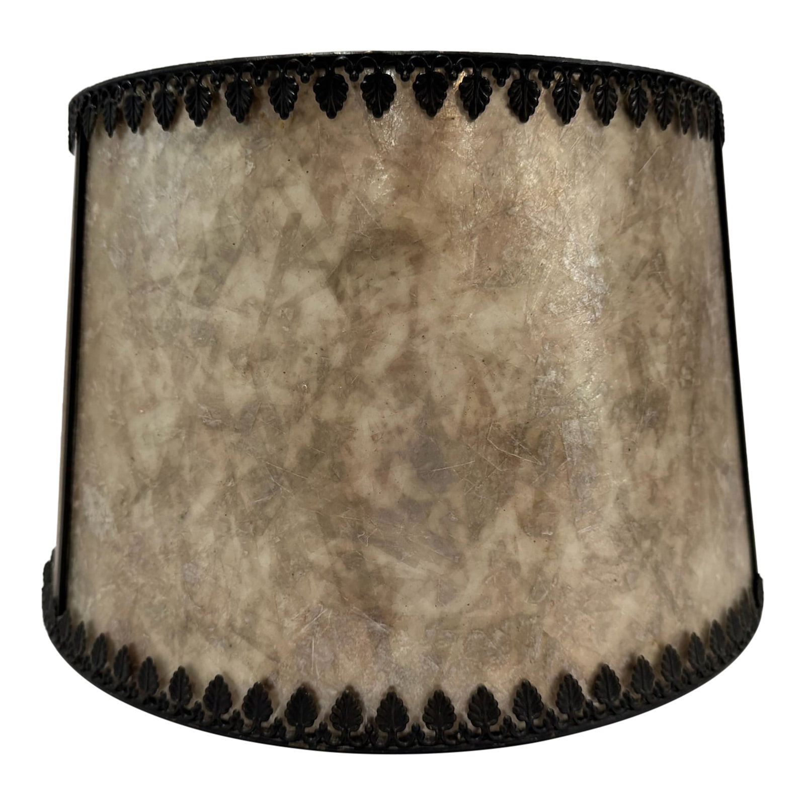 Vintage Mica Parchment Lamp Shade Black Filigree Leaf Trim: Drum-form vintage lamp shade with mottled amber parchment or mica panel, framed by ornate black oxidized metal filigree trim at both top and bottom edges. The trim features a repeating stylized leaf o