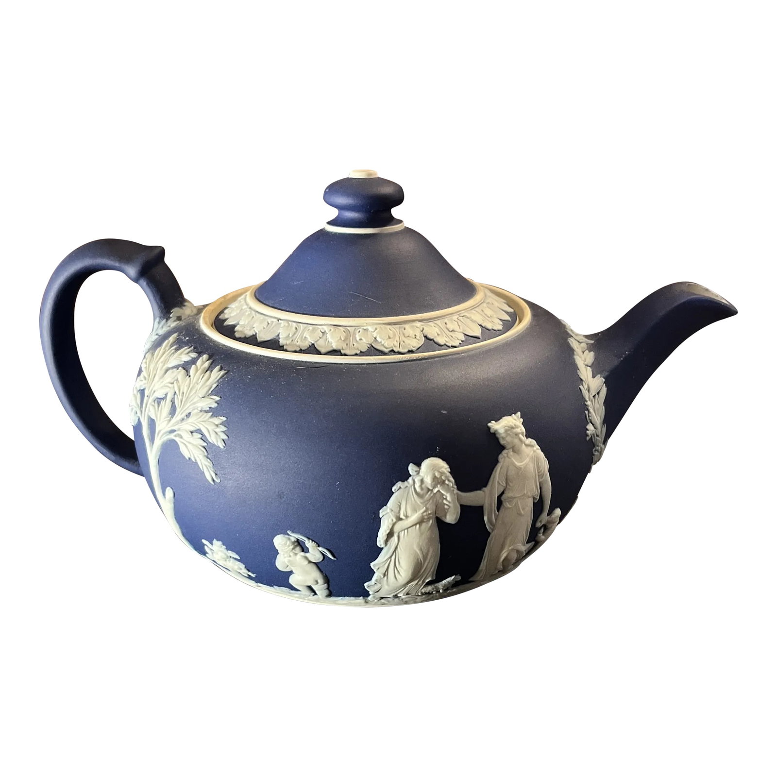 Early 20th Century Wedgwood Blue Jasperware Teapot & Lid: Cream Color on Wedgwood Blue Jasperware with neoclassical relief. Condition: Alterations: Original Condition Unaltered Imperfections: Some Imperfections Condition Notes: Small stain on interior, other