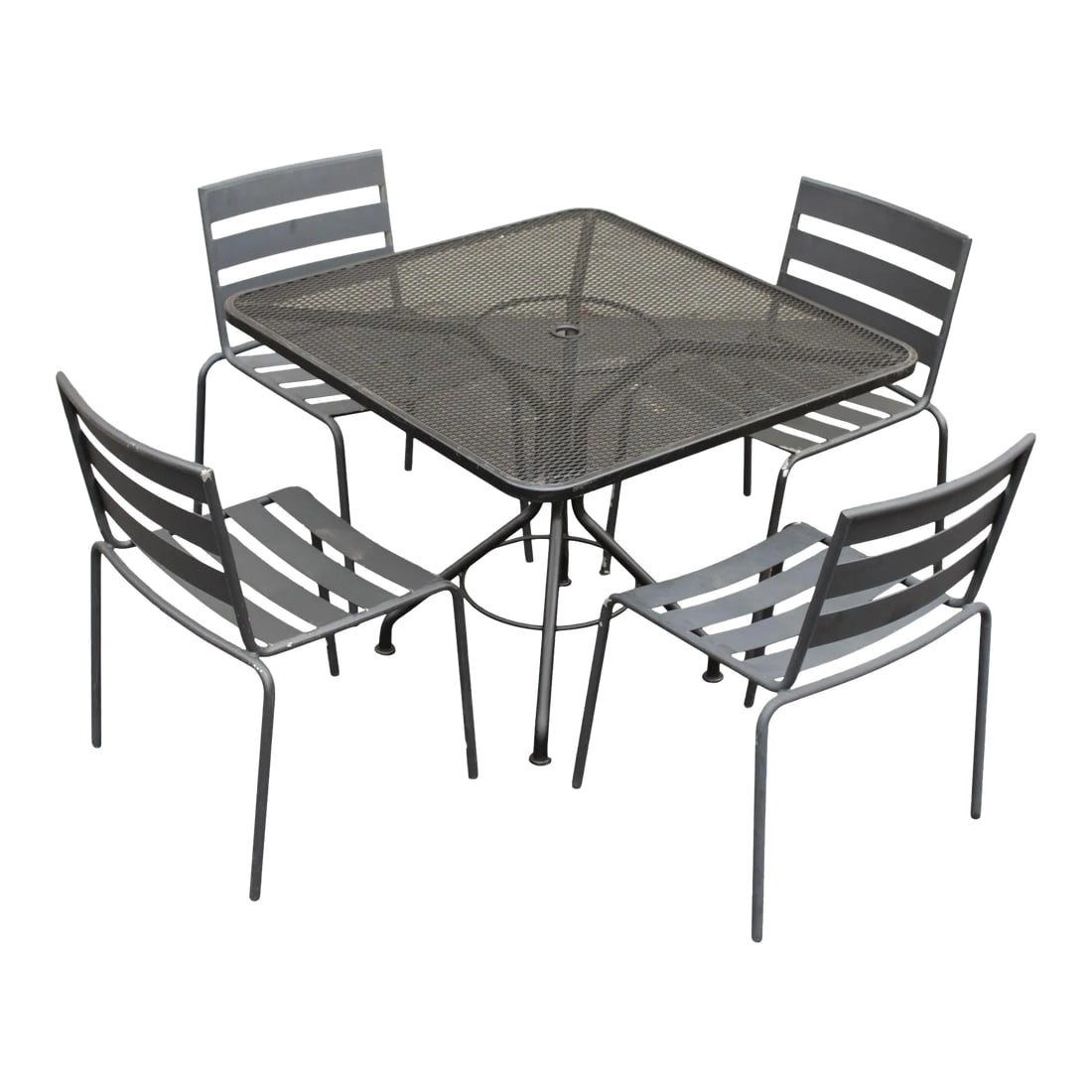 Early 21st Century Metro' Wrought Iron Outdoor Dining Set - 5 Pieces: High Quality Wrought Iron Outdoor Patio Dining Table and Set of Four Matching Chairs, by Woodard (Not Labeled) Condition: Alterations: Original Condition Unaltered Imperfections: Some Imperfections Co