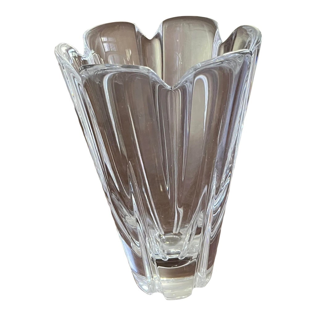 Crystal Vase by Orrefors of Sweden: Created in Sweden, Orrefors is world renowned for its beautiful glass blowing and crafting designs. The cut is pedal like. This is a very heavy piece. It will fit with any decor. Condition: Alteration