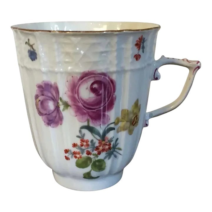 Antique 19th Century Meissen Porcelain Tall Cup for Tea or Coffee: Antique 19th century Meissen porcelain tall cup for tea or coffee. Decorated with hand painted flowers on a basketweave ground. Measures 3 1/8" tall. Good condition - small frits to the foot rim does 
