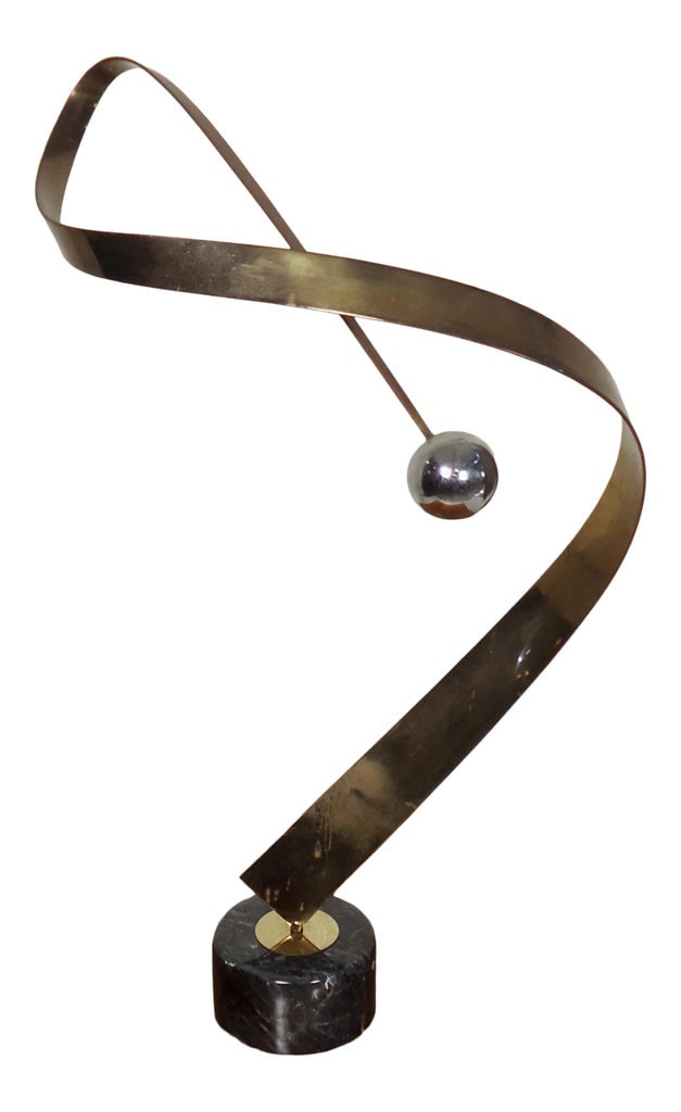 Curtis Jere Abstract Chrome & Brass Ribbon Sculpture: Fantastic spiral brass sculpture set on black marble base. Signed by the artist. Dimensions: H 33in. x W 18 in. x D 16 in. Condition: age appropriate wear Condition: Alterations: Original Condition