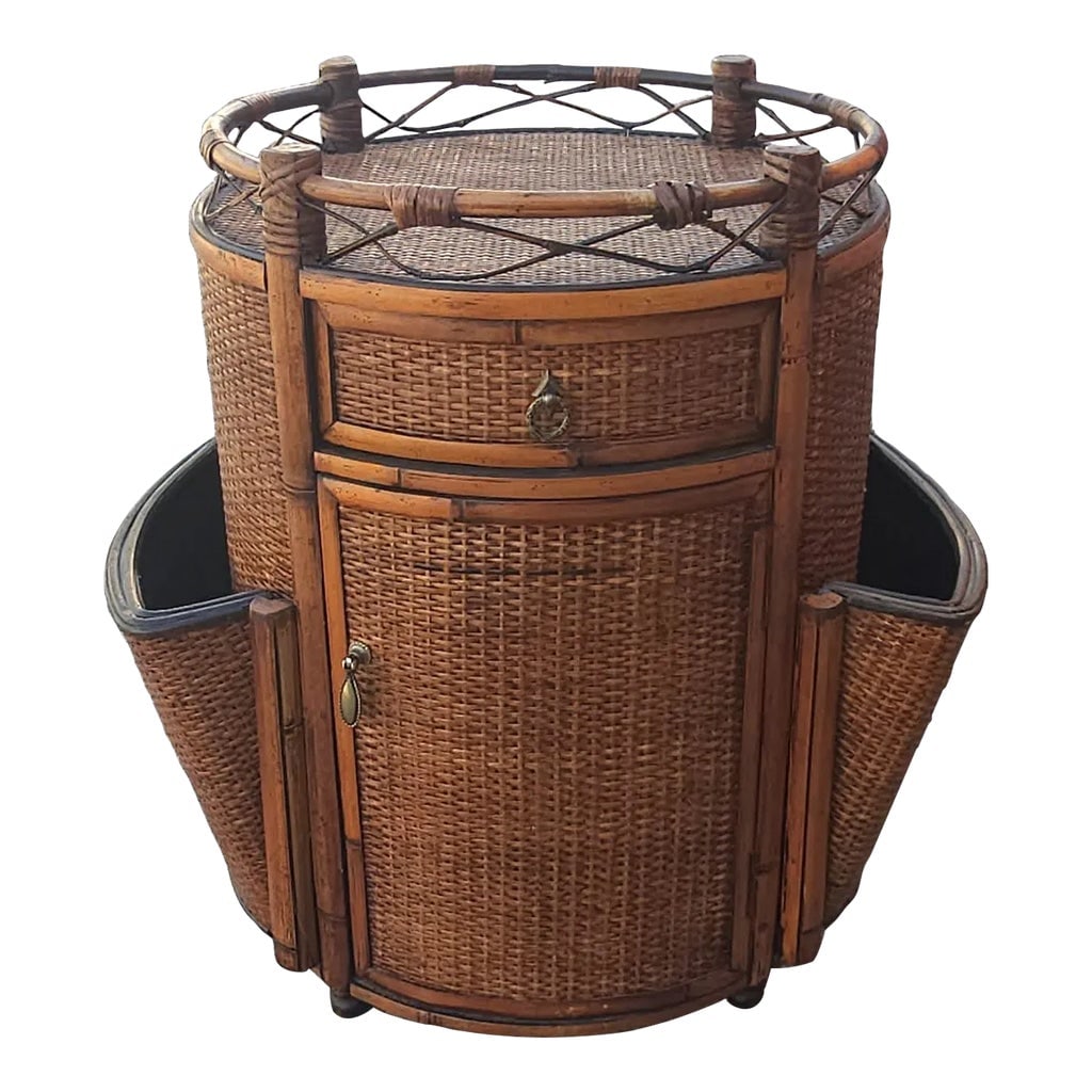Mid 20th Century Seven Seas Hooker Bamboo Side Cabinet Magazine Rack: This Hooker Furniture Seven Seas Collection cabinet with magazine rack combination is a classic piece. Having a bamboo and rattan style oval cabinet with a drawer over a door and two side magazine