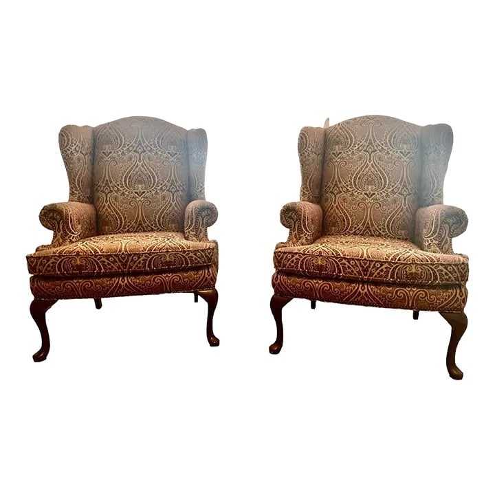 1970s Pair of Sherrill Furniture Wingback Chairs in Paisley Fabric: beautifully appointed pair of vintage wingback chairs in stunning paisley tweed .earth tones of cream , tans and cinnamon and wine .mahogany frame , robust comfortable chairs they have a proud stance