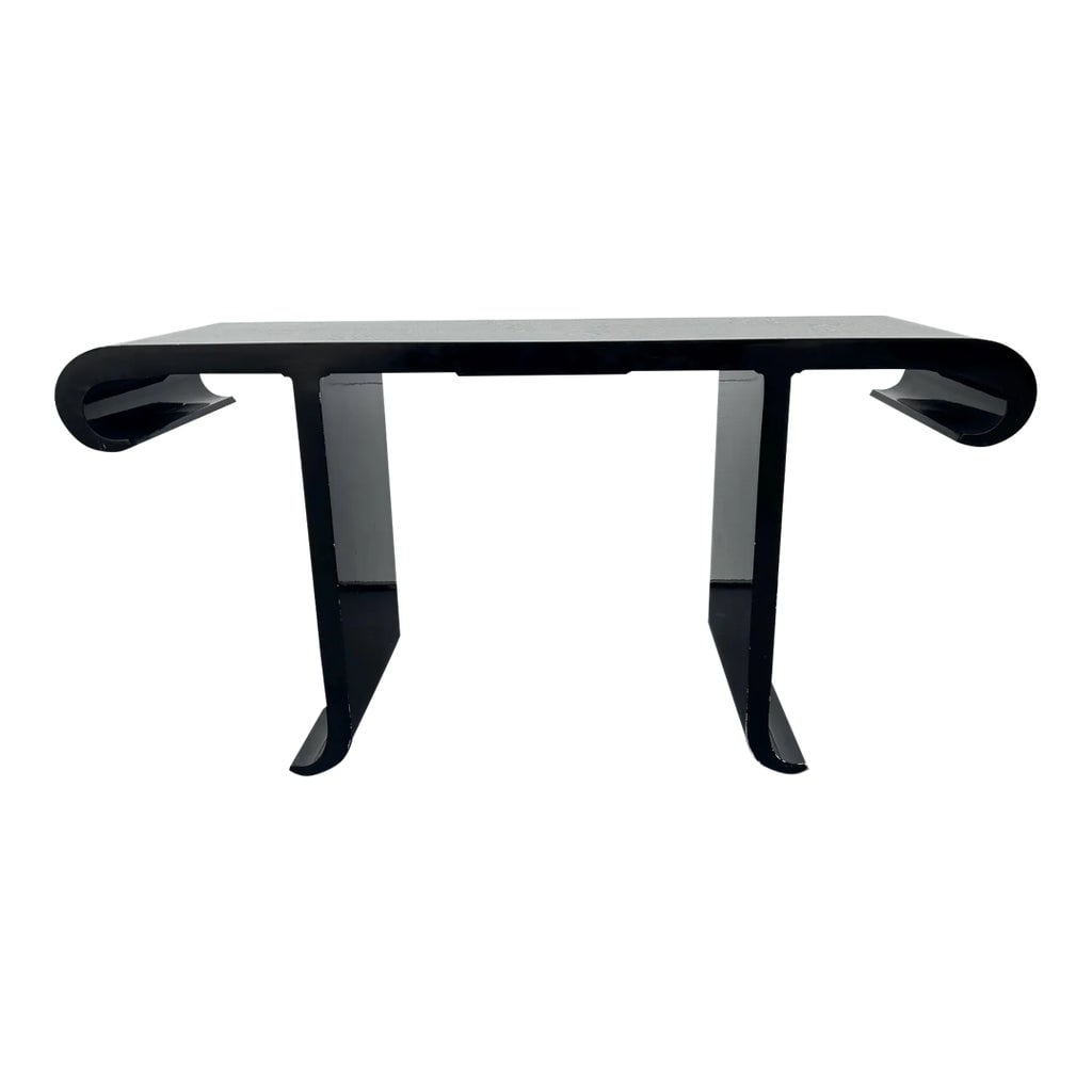 1980s Vintage Black Stylized Asian Scroll Console Attributed Baker Style: This console is a modern take on an Asian Scroll altar table. It is nearly identical to the Allesandro Collection for Baker. It has beautiful curves on the top and legs. The piece is black and the pie