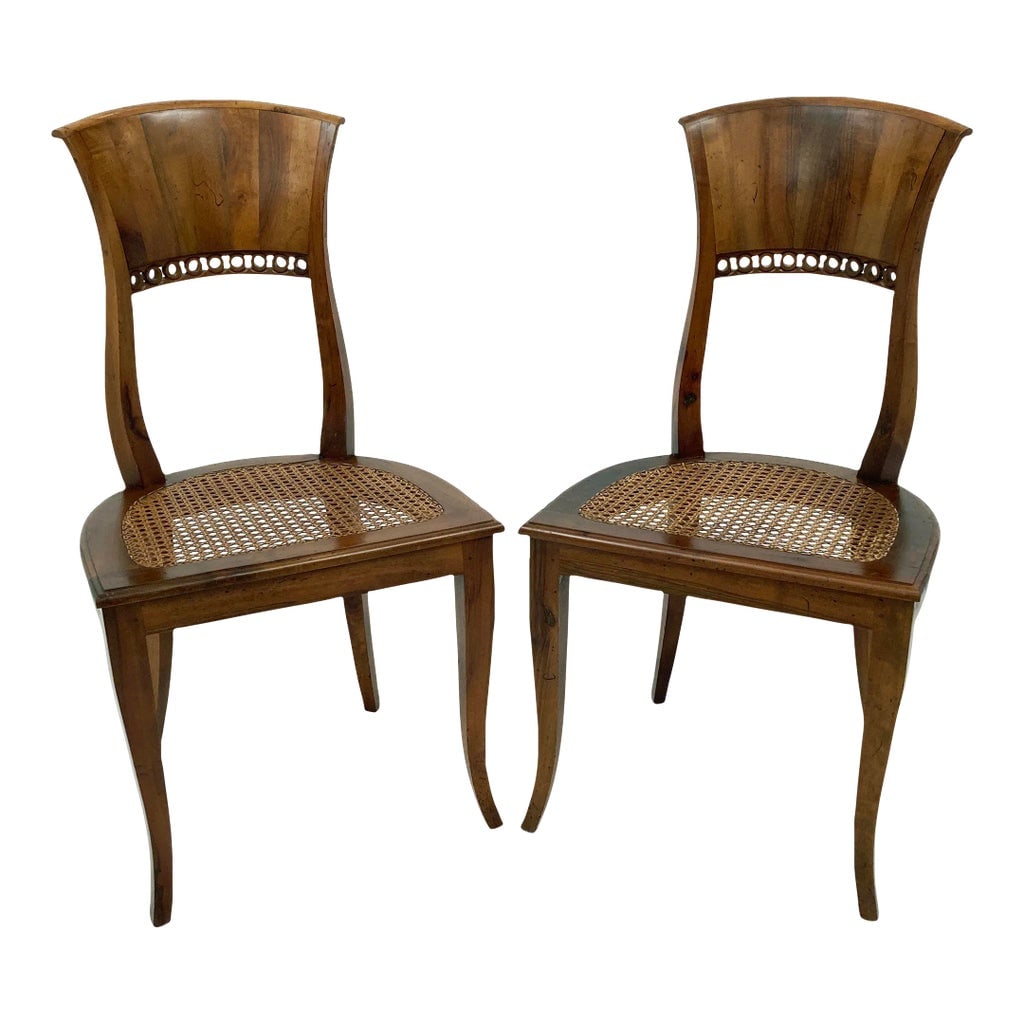 Pair of Early 1920's Italian Biedermeier Style Side Chairs: Stunning and very true to the Biedermeier style, these two side chairs are nothing short of gorgeous. Biedermeier designers rejected the dark ebony and mahogany so common in Empire furniture for