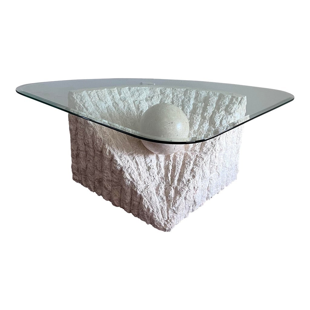1980s Postmodern Coffee Table Tessellated Mactan Stone: Natural & Organic postmodern Mactan stone coffee table. Triangular glass atop a stone base & Orb. Matching side Table, entry table & Mirror available. Please Contact for a combined shipping fee.
