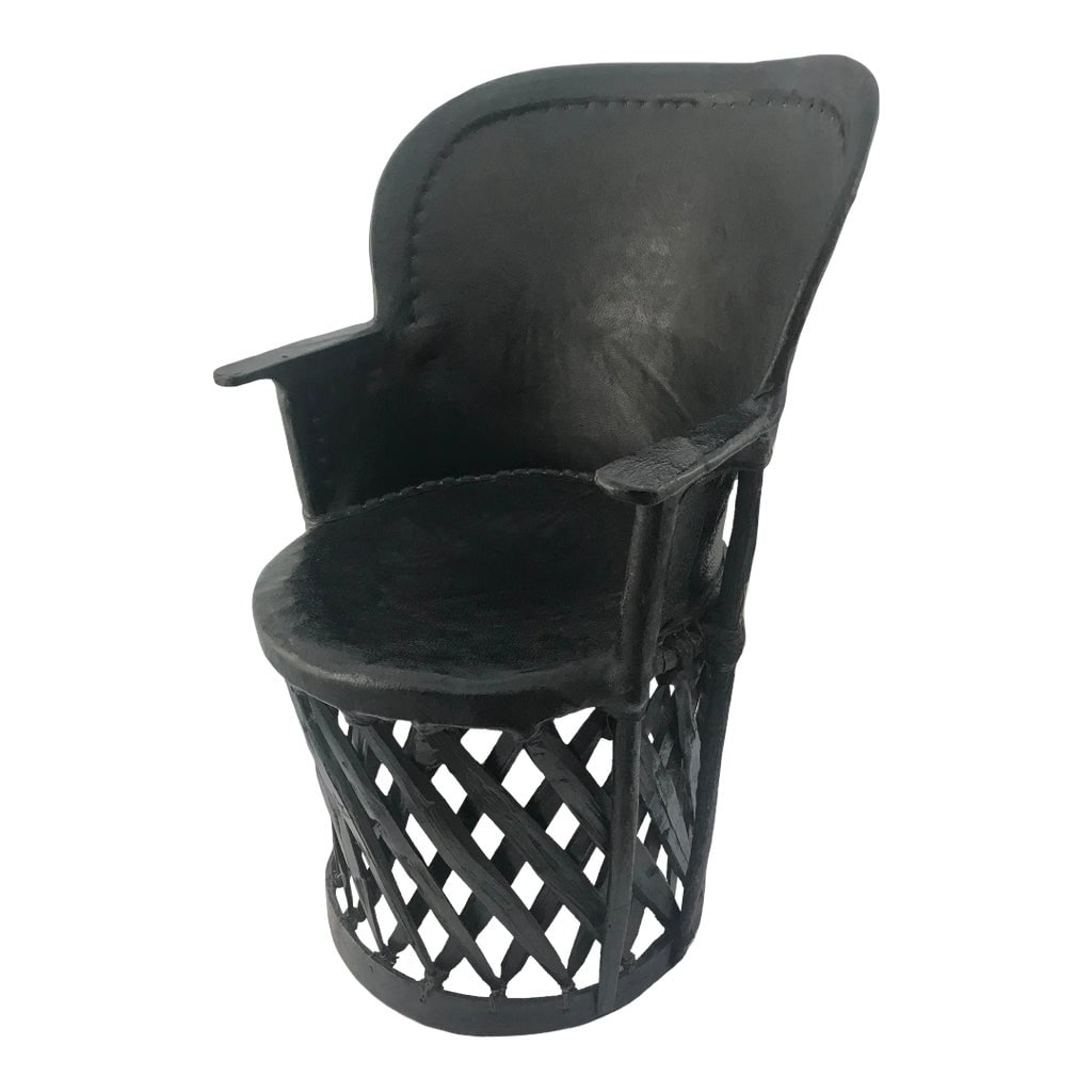 Early 1900s Antique Equipal Wingback Chair of the Gods: Master craftsmanship. Beautiful aged leather backrest and seat, unusual winged back shape, perfectly pitched for back support. Reed and rope seat support. Gorgeous patina. Curved base accommodates