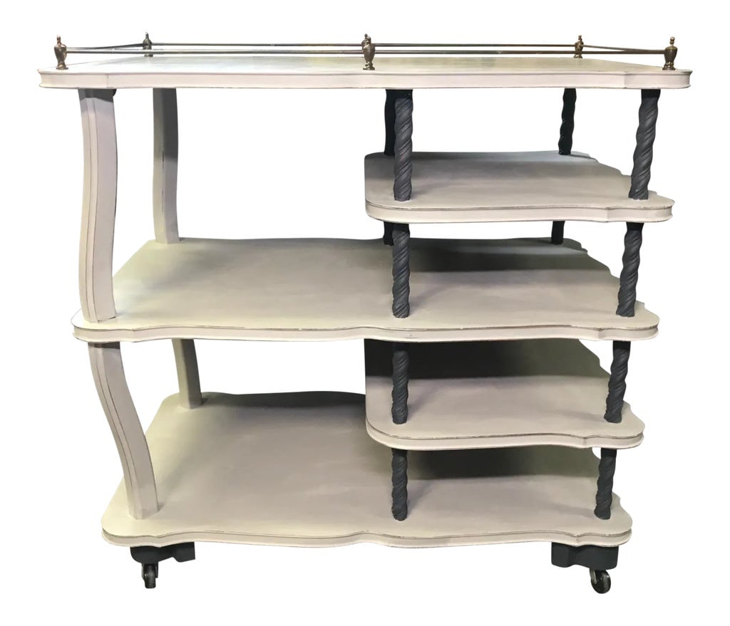 Painted Bar Cart: Vintage bar cart newly painted in a warm light grey with accents in dark navy (almost black). This wood cart has an interesting antique brass gallery. The twisted shelf supports are solid wood and