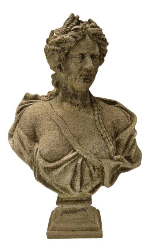 19th Century Stone Bust on Pedestal: A 19th century carved stone bust. The handsome figure in Greco-Roman attire with toga draped over the shoulder and a laurel wreath around the head. Suitable for indoor and outdoor use.. 19th Century,