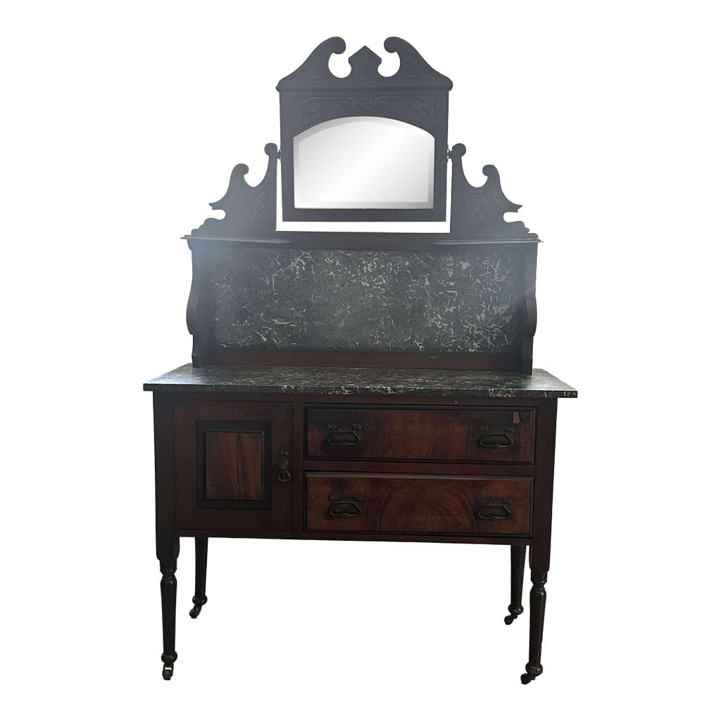 Early 20th Century Victorian Eastlake Marble Top Washstand With Marble Backsplash: This Victorian Eastlake marble top washstand is a stunning example of 19th-century craftsmanship and charm. Featuring a rich wooden frame with beautifully carved details, it boasts coordinating a