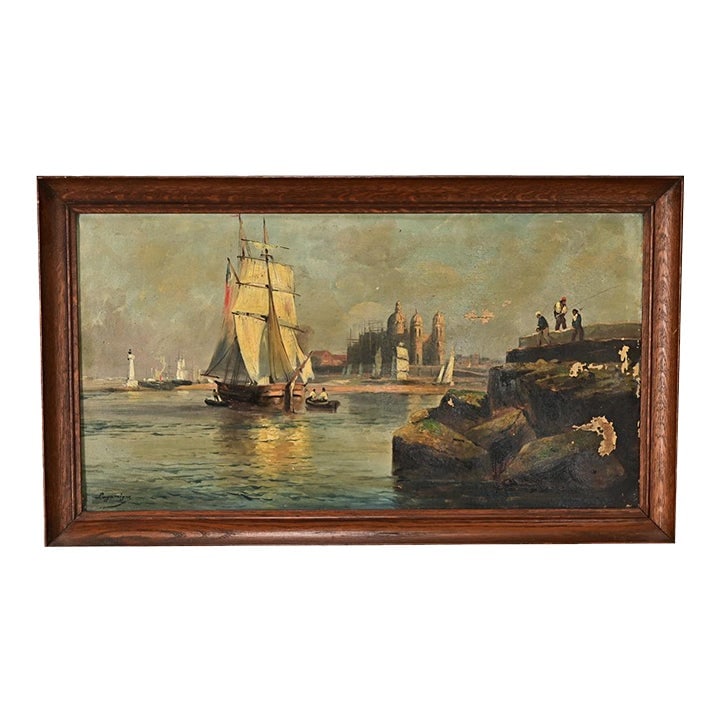 French Vintage Oil on Canvas Seascape Painting: French, early 20th century framed oil on canvas painting of a seaside harbor in an exotic locale of indeterminate time and place. The scene is dominated by a large schooner whose sails are