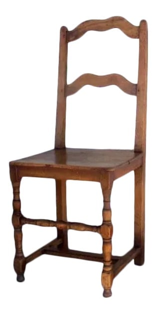 French Fruitwood Wavy Ladderback Chair Plank Seat: French fruitwood wavy ladderback chair. Pegged construction. 18th century Condition: Alterations: Unknown Imperfections: Some Imperfections Condition Notes: Vintage item, shows signs of wear Origin: F