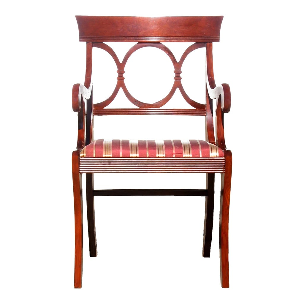1930s English Regency Style Mahogany Klismos Accent / Desk Chair: Handsome English Regency style accent or desk chair fabricated of mahogany with scrolled arms, circle motif back rail, curved crest, and saber legs. A Tell City Chairs paper label is found en verso; o