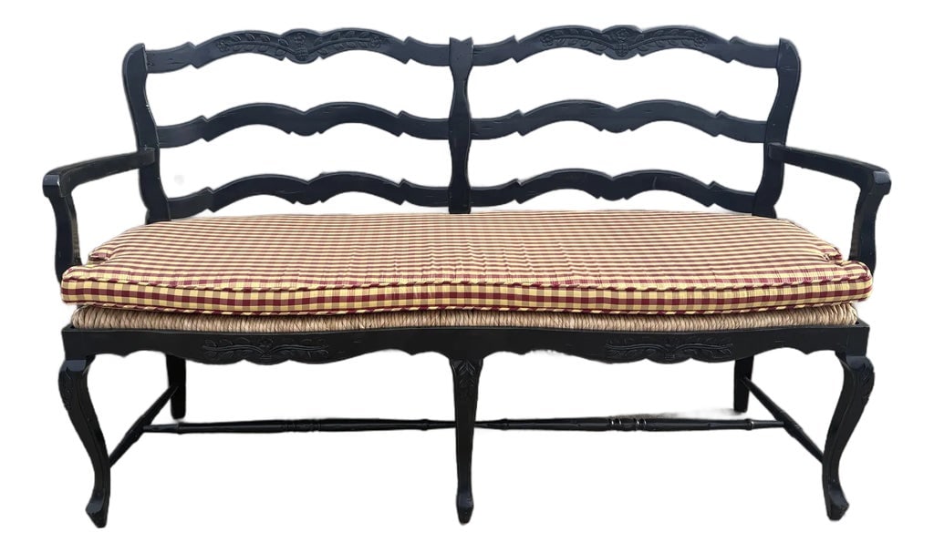 Fremarc Attributed Custom French Provincial Black Ladder-Back Rush Seat Settee: A beautifully crafted French Provincial ladder-back settee, attributed to Fremarc based on its distinctive carving style, frame construction, and high-quality handwoven rush seat. Fremarc is known for