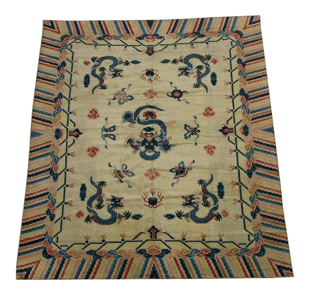 Antique Chinese Dragon Design Rug: Antique Chinese Rugs, as opposed to most of the antique rug productions, were woven almost exclusively for internal consumption. Since they were mostly sheltered from European and Western influences,