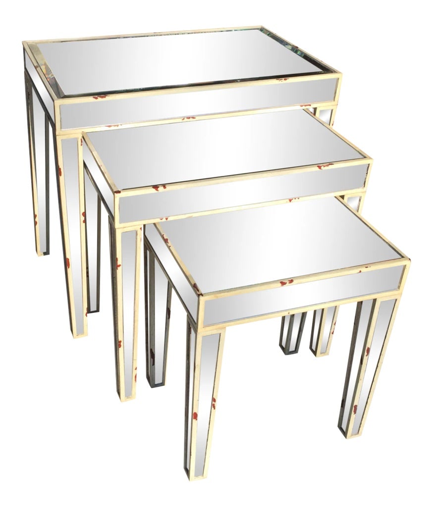 Mirrored Nesting Tables - Set of 3: Bring some light into the room, keep them together or spread them around a room. Three mirrored nesting tables. Made by Interlude. In excellent condition. The top table has a small scratch in it, it
