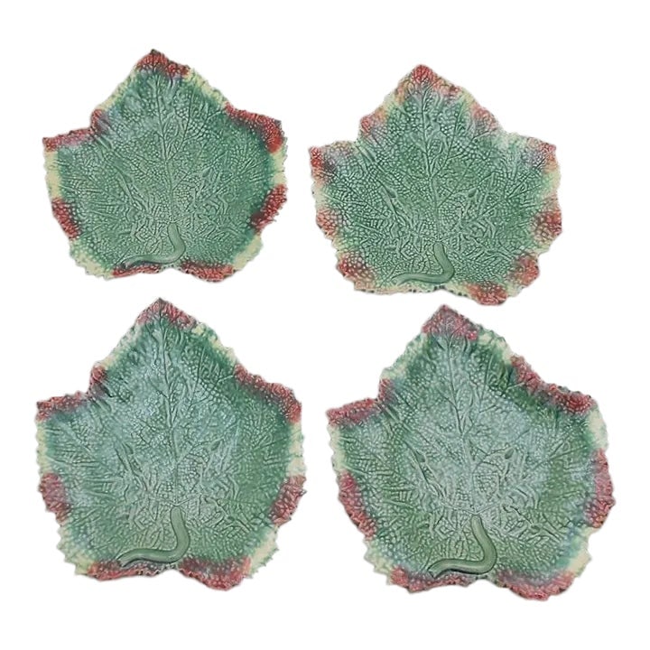 Set of 4 Bordallo Pinheiro Autumn Harvest Leaf Green Red Yellow Majolica Portugal Dinner Plates: This fabulous vintage Bordallo Pinheiro leaf shaped set of 4 dinner dishes are in the Autumn Harvest pattern and is created in a gorgeous green with a red and yellow edged border. It is made in Portug
