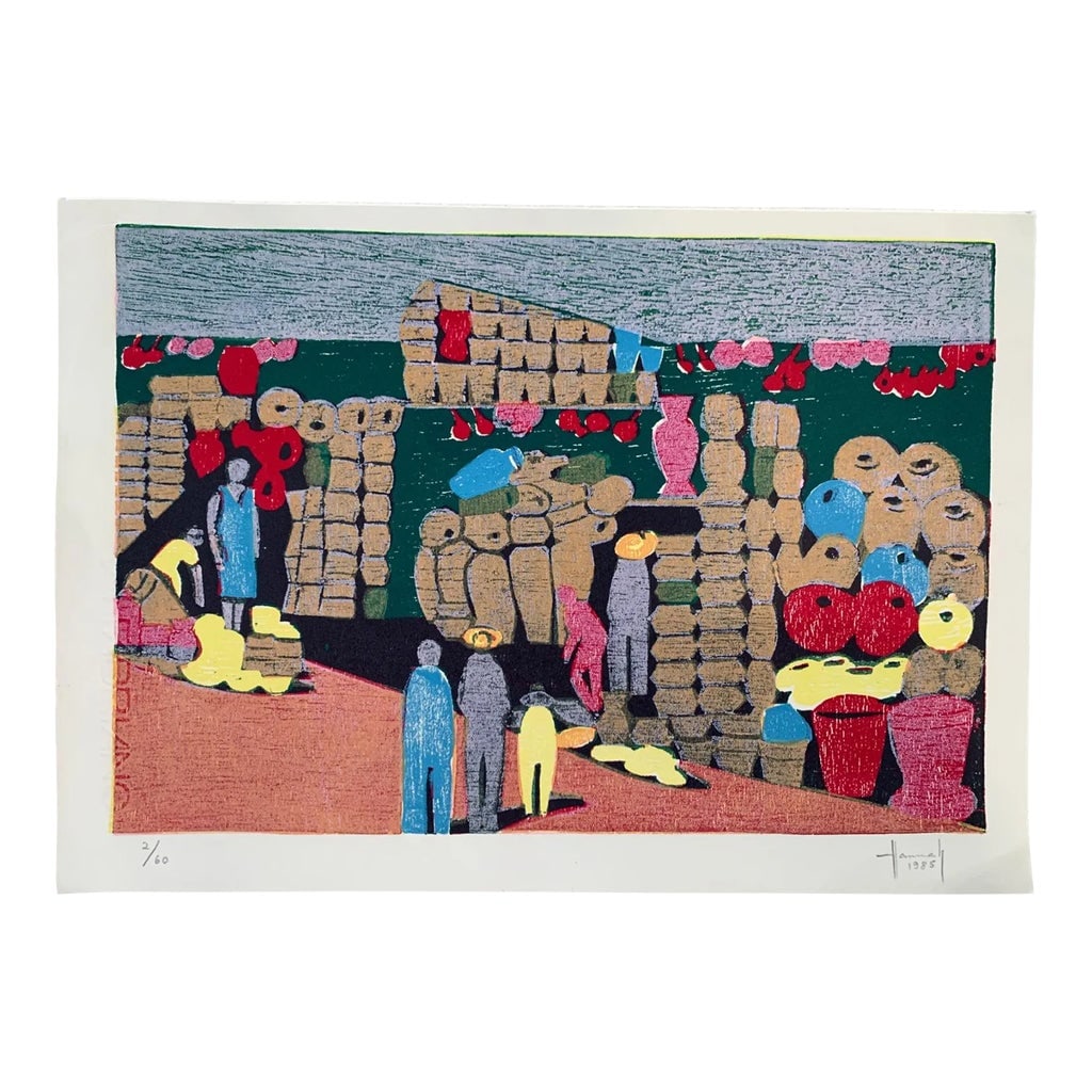 Limited Edition Woodcut Signed and Numbered by Brazilian Artist Hannah Brandt 2/60: Woodcut print by Brazilian artist Hannah Brandt (1923-2020). This piece depicts a Brazilian marketplace with people gathered and baskets of goods about . Colors of red, blue, pink and blue. Is