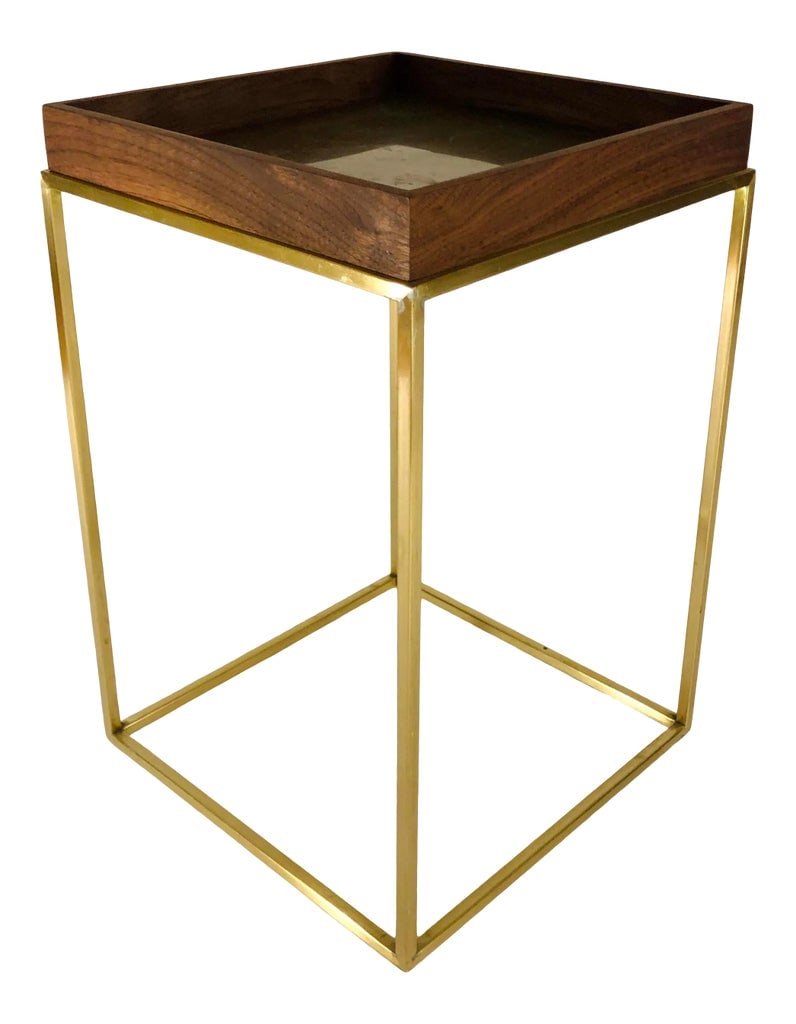 Sabin Anacapa Walnut and Brass Tray Side Table: Understated but by no means invisible, this light side table is the attractive combo of elegance and substantiality. The epitome of minimalist luxe, imagine it at the end of a couch or sitting pretty