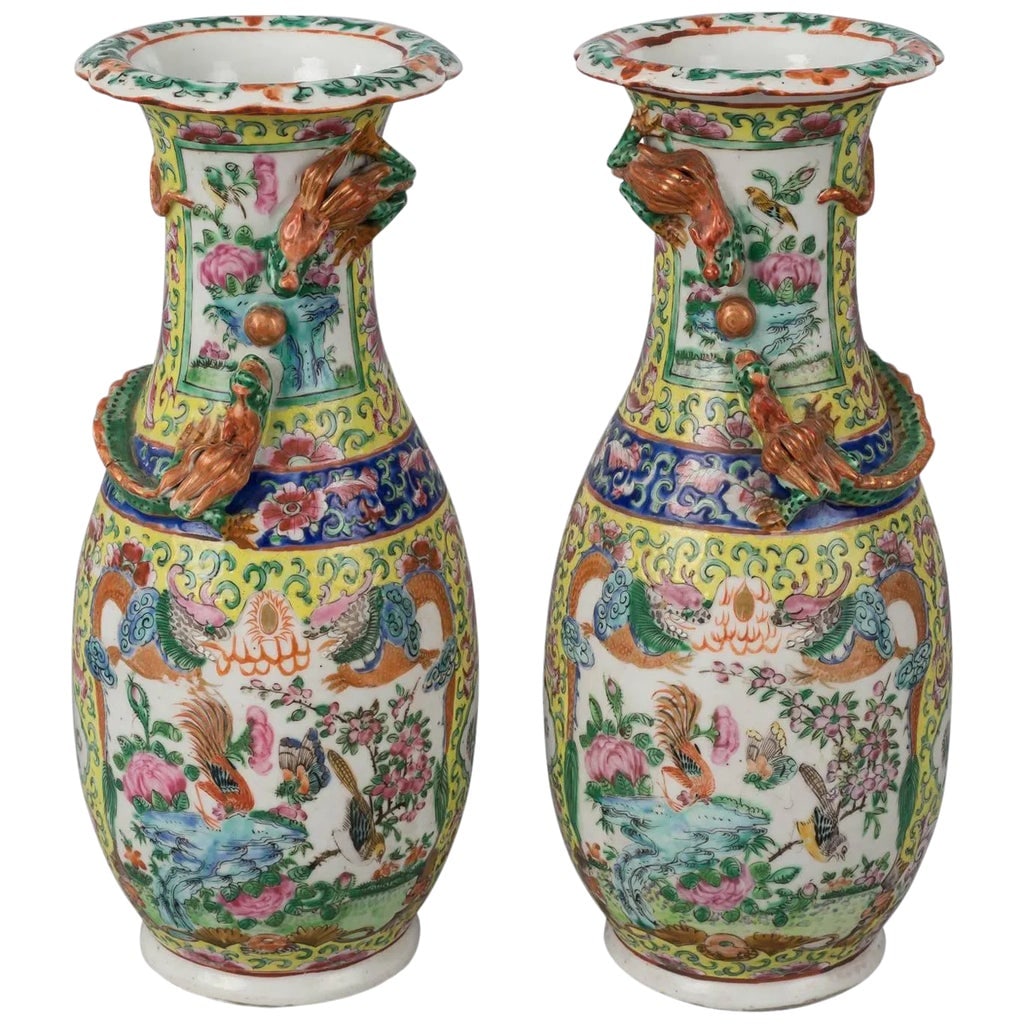 Chinese Export Canton Open Vases - a Pair: Pair Chinese export porcelain polychrome baluster-shaped open vases with scalloped rim, two dragons encircling the neck, two panels enclosing birds, butterflies and flowers framed by two dragons, done