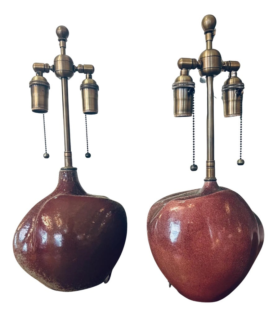 Pair of French 1960s Tim Orr Art Pottery Mid Century Table Lamps: An excellent pair of French mid century sculptural art pottery table lamps by French Artist, Tim Orr. Rewired with aged brass double sockets. Signed. The vase measures 8.5" H x 8.5" W x 4" D. Biograph