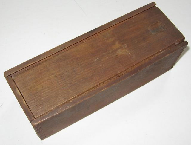 Antique Ebony & Ivory Domino Set + Wood Box: Ebony and ivory pieces with brass pins. Box measures 7” x 2 1/2” x 2 3/8” (17.8 x 6.4 x 6.0 cm). Age thought to be late 19th century.