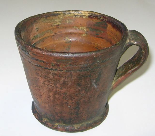 “PEI Pottery” Earthenware Cup c1890 (Unsigned): Measures 3 ¾” diameter, 3 ½’ tall, 4 ½” handle to rim (9.5, 8.9, 11.4 cm). Incised pattern at rim. Collection of Pat & Connie Kent, former operators of Granary Antiques, Fairfield, PEI.