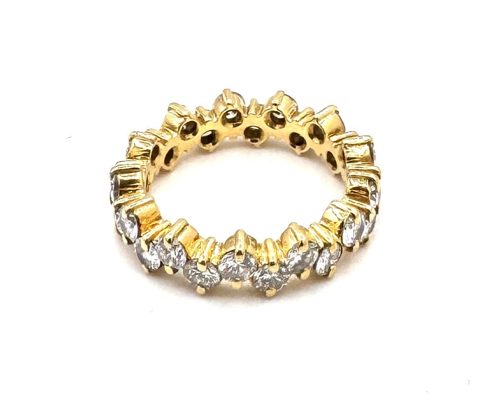 A DIAMOND ETERNITY RING A continuous line of brilliance in 18k gold (1 of 1)