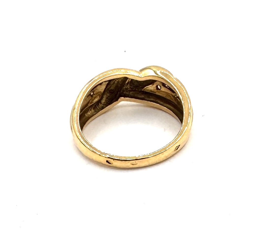 A DIAMOND GADROONED DRESS RING A bold sculptural band in 18k gold (1 of 2)