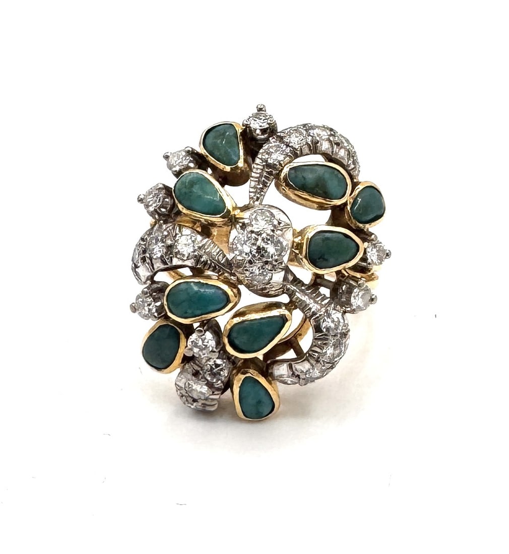 A TURQUOISE AND DIAMOND "BOMBE" RING A spectacular mid-century inspired cluster in 18k gold: A magnificent and voluminous "Boule" (dome) ring, masterfully crafted in 18k yellow gold (750/1000). This statement piece features a high-domed silhouette, intricately set with a constellation of circ