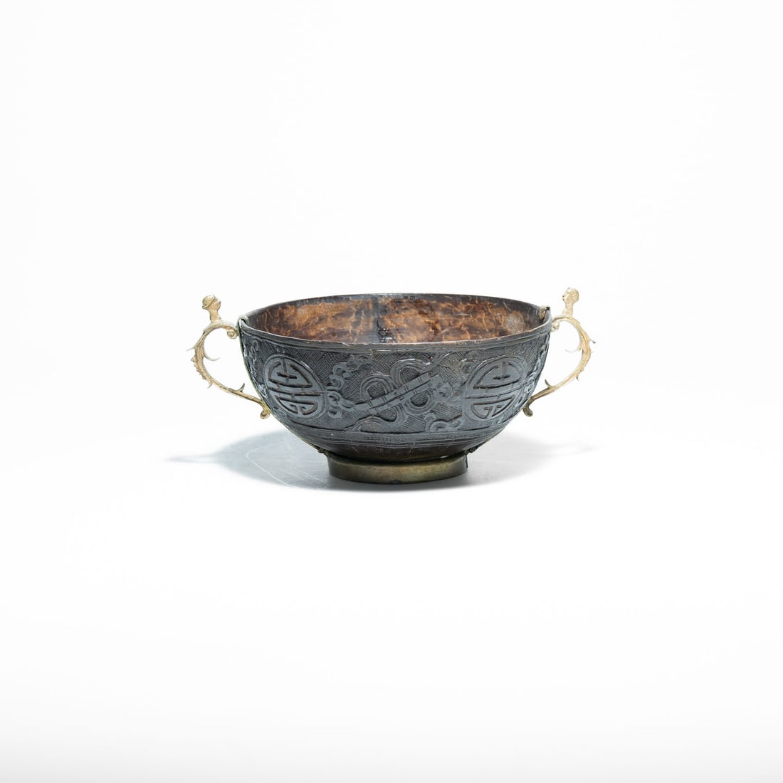 Fine Chinese Carved Coconut Shell Bowl 18th Century: Hand-carved from a single coconut shell, a material prized for its hardness and ability to hold fine detail. Featuring a rich dark brown patina developed over decades of use.