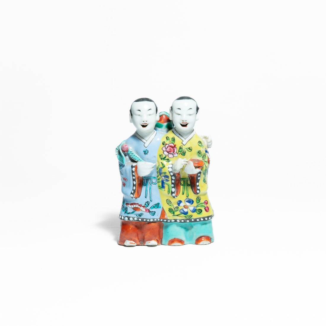 Chinese porcelain group known as Laughing Boys Qing Dynasty (1644-1912): It is a classic motif in Chinese art, often representing the twin immortals Hehe Erxian, who symbolize harmony, union, and happy. It features polychrome decoration using Famille Rose enamels, characte