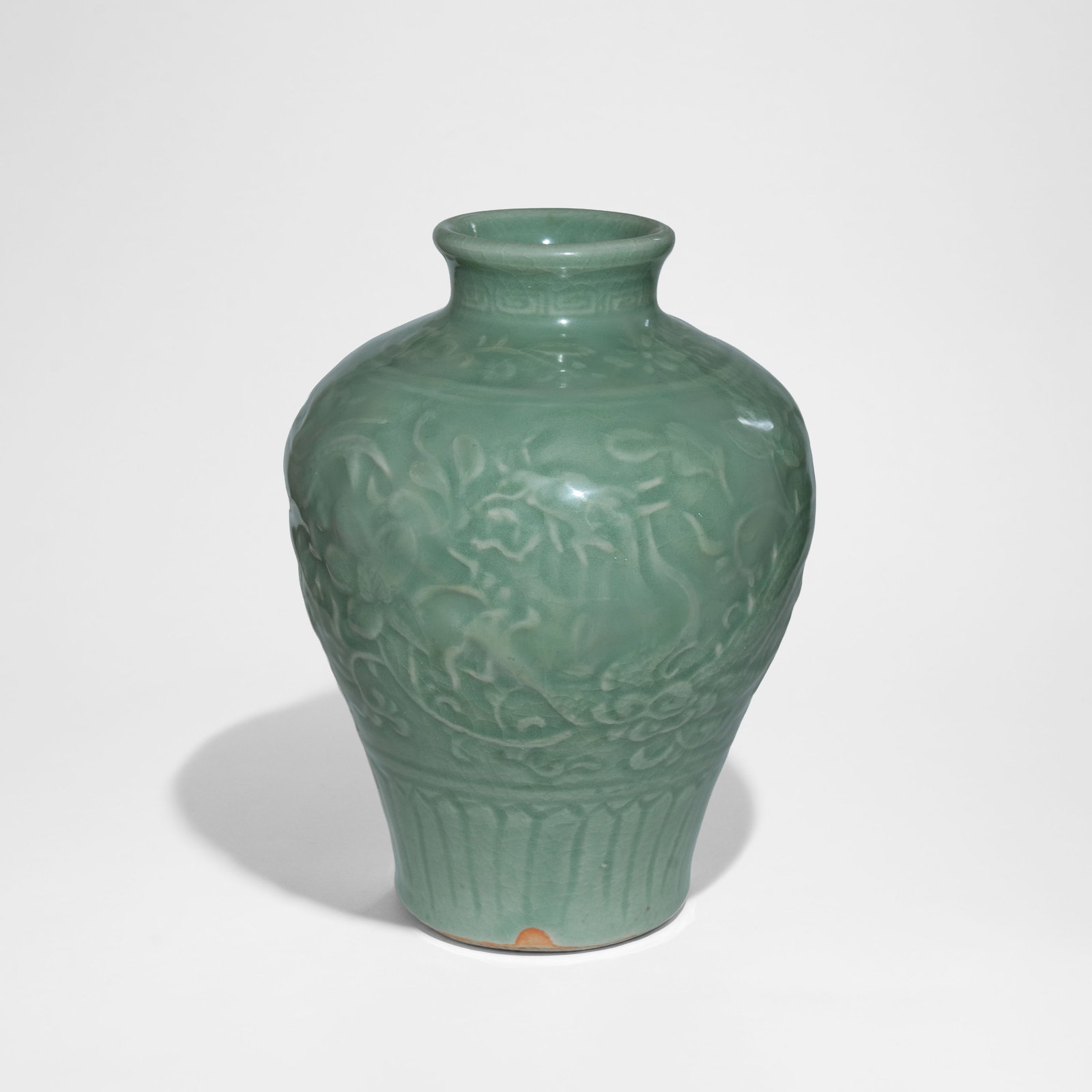 A rare celadon-glazed 'Dragon' meiping vase China, Ming Dynasty, circa 1400 (1 of 4)