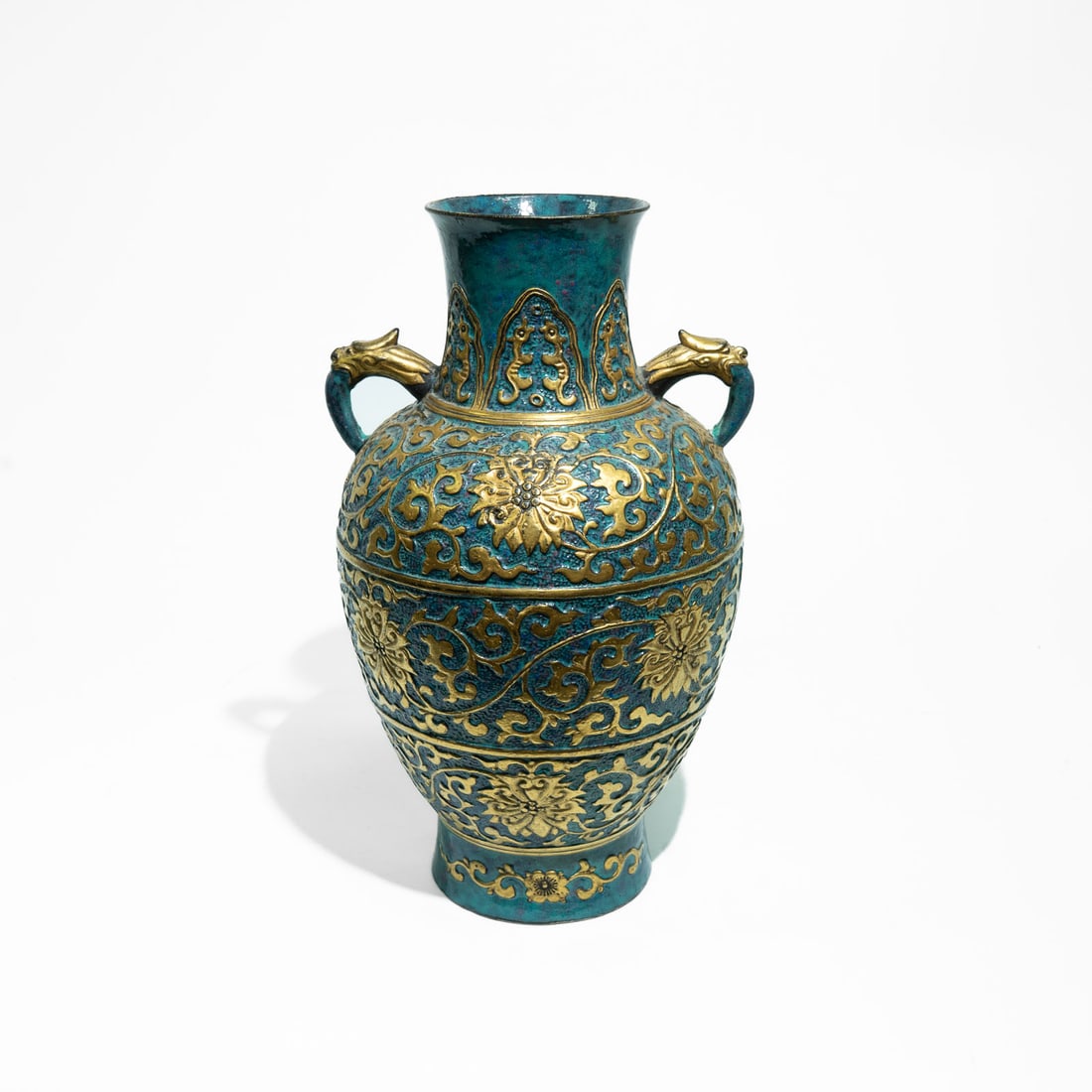 Gilt-Bronze and Imitation Turquoise Enamel Hu Vase China, Republic Period (1912–1949): An unusual and heavily cast decorative vase modeled after an archaic ritual Hu shape.The ovoid body rises from a slightly splayed foot to a high shoulder and a gently flaring neck, f