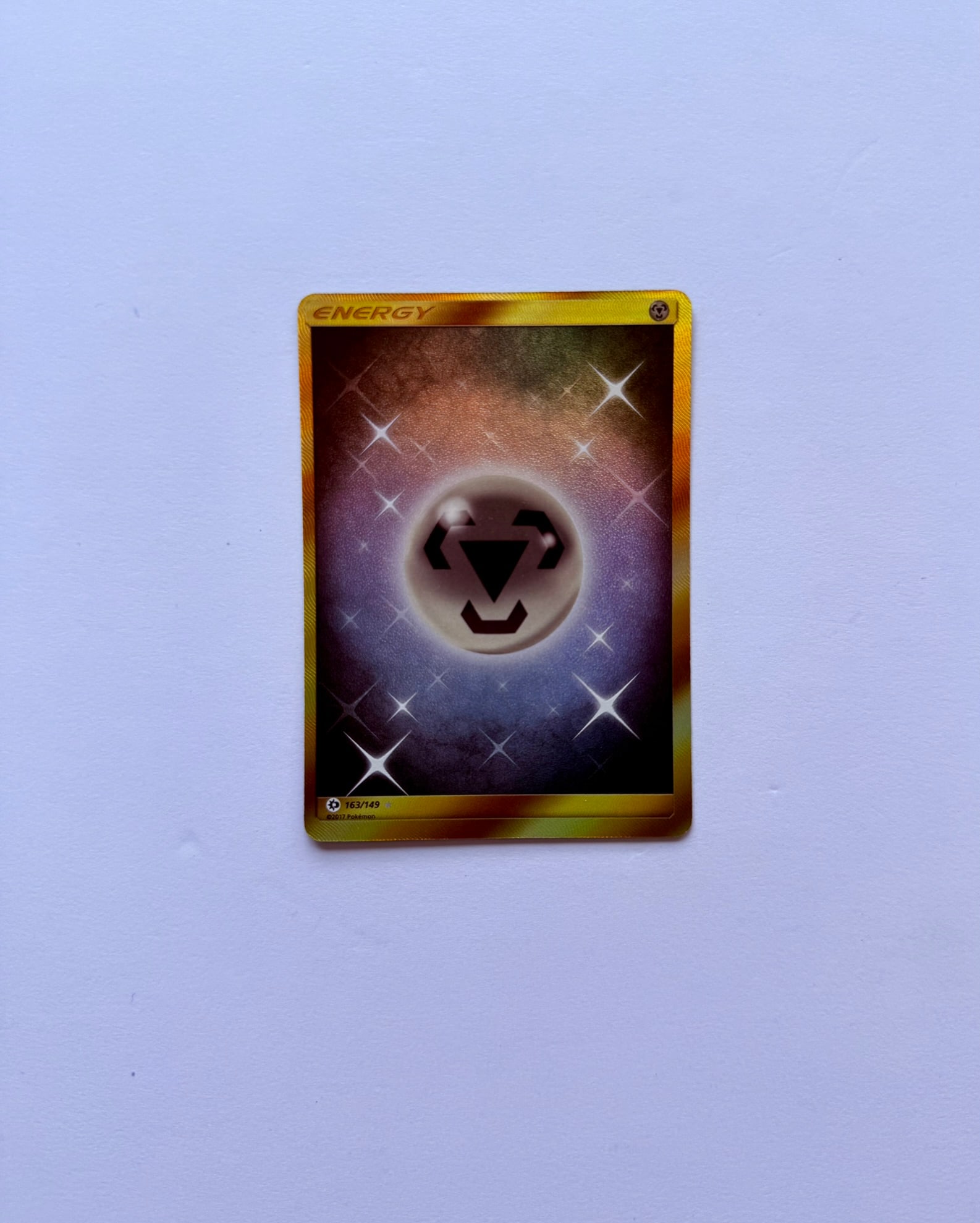 Gold Metal Energy 163/149 Pokemon Card: Gold Metal Energy 163/149 Pokémon card. Card is in Near Mint condition. Please see photos for overall condition before bidding.