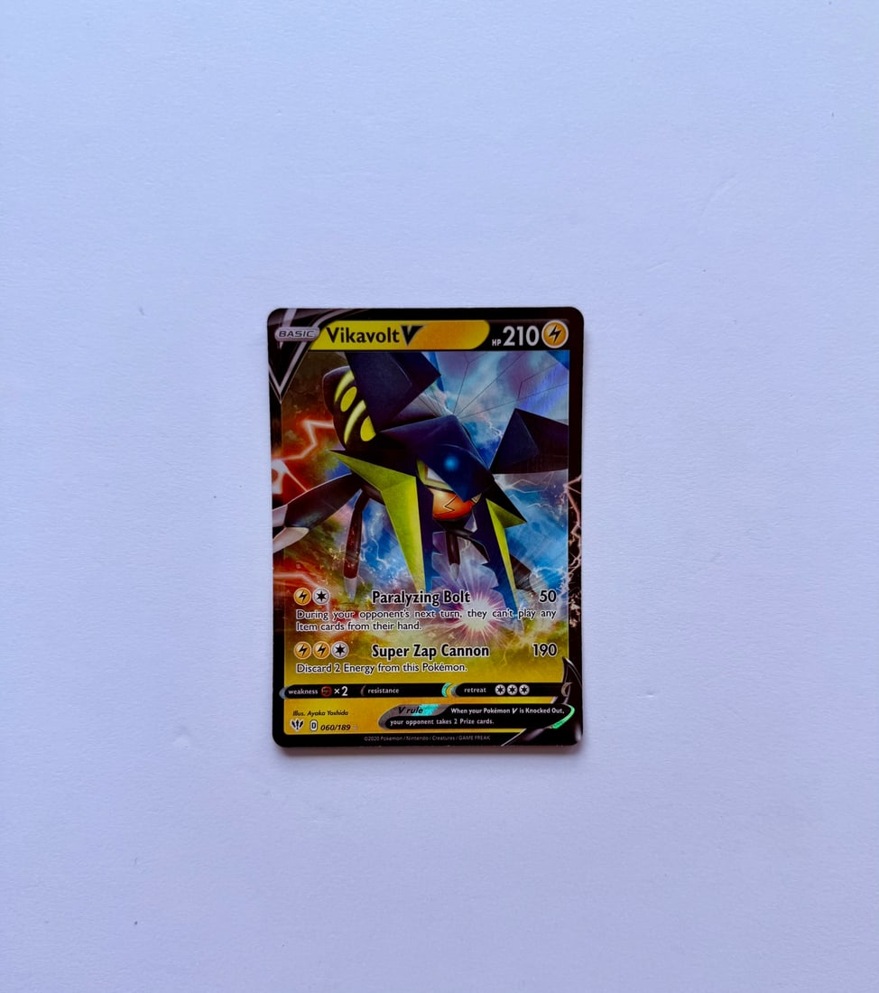 Vikavolt V 060/189 Pokemon Card: Vikavolt V 060/189 Pokémon card. Card is in Near Mint condition. Please review photos carefully for overall condition before bidding.