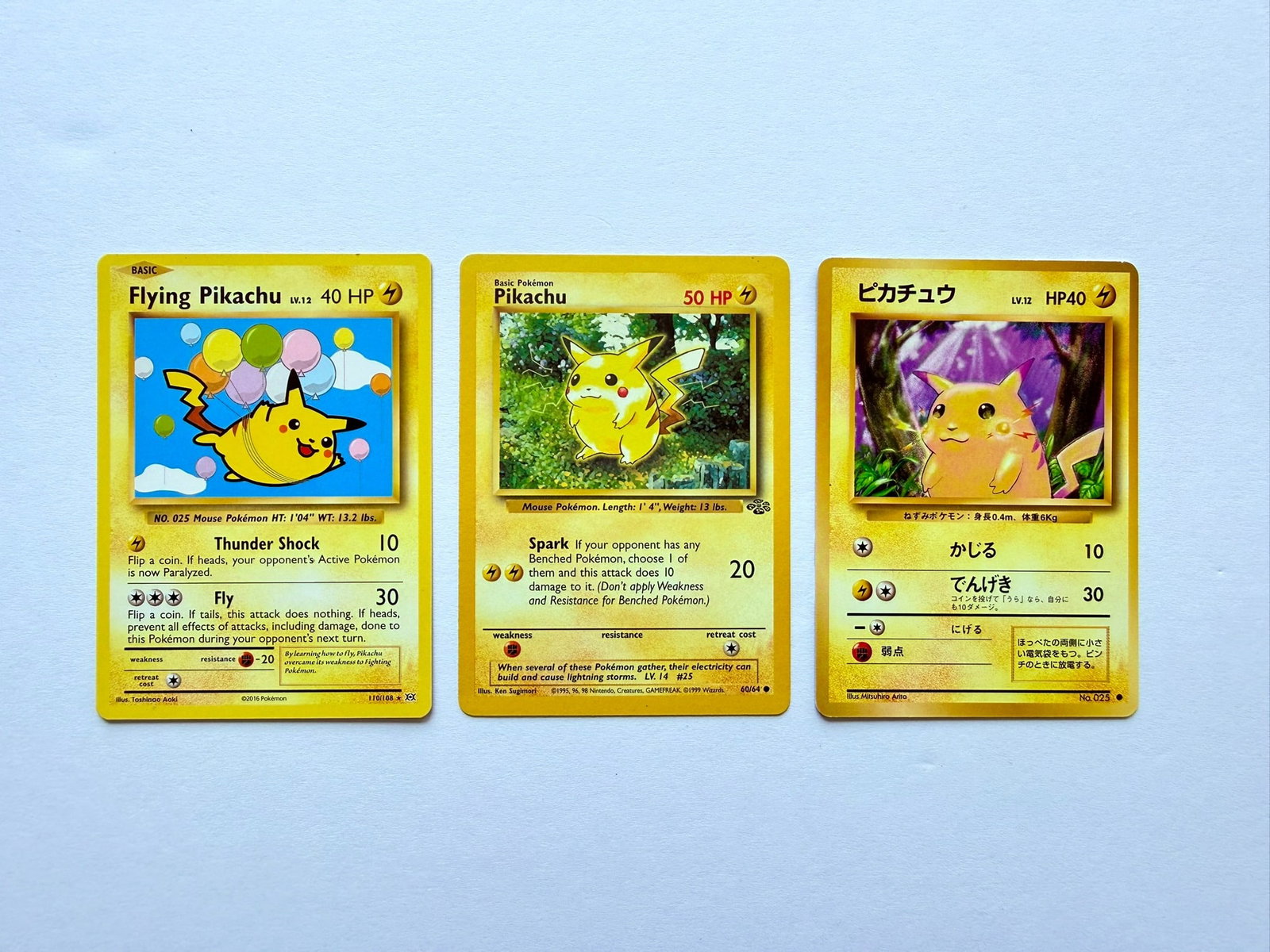 Flying Pikachu Jungle Pikachu Japanese Pikachu Promo Card Lot: Pokémon Pikachu promo card lot featuring Flying Pikachu, Jungle Pikachu, and Japanese Pikachu cards. Cards appear in good overall condition. Please review all photos carefully for exact condition bef