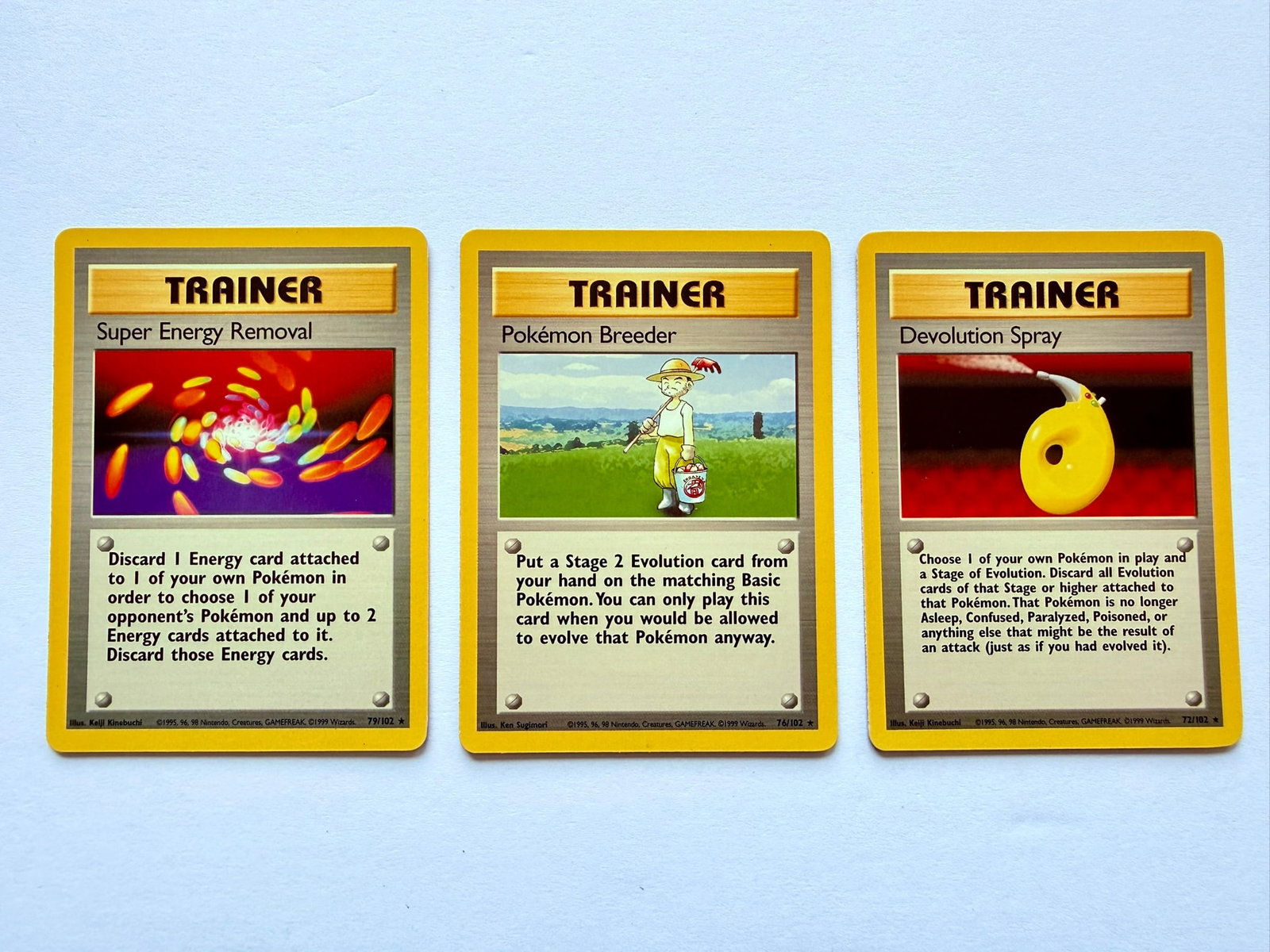 Shadowless Pokemon Trainer Card Lot Devolution Spray Pokemon Breeder Super Energy Removal: Vintage Shadowless Pokémon trainer card lot including Devolution Spray, Pokémon Breeder, and Super Energy Removal. Classic Wizards of the Coast era cards. Cards appear in good vintage condition. Ple