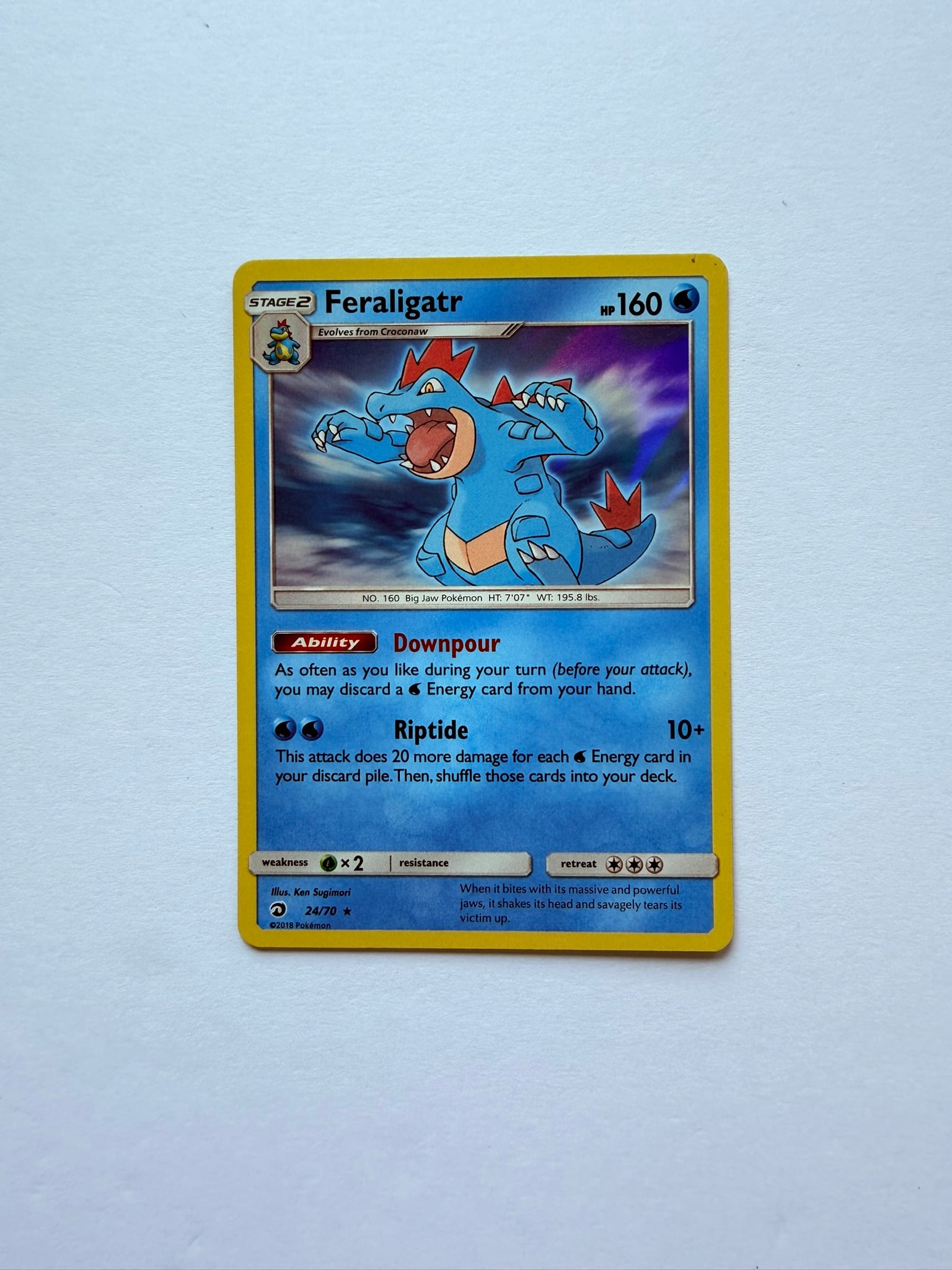 Feraligatr 24/70 Dragon Majesty Pokemon Card: Feraligatr 24/70 Pokémon card from the Dragon Majesty set. Card appears in Near Mint condition.
